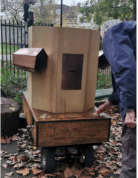 A man turning a dial on the Future Machine